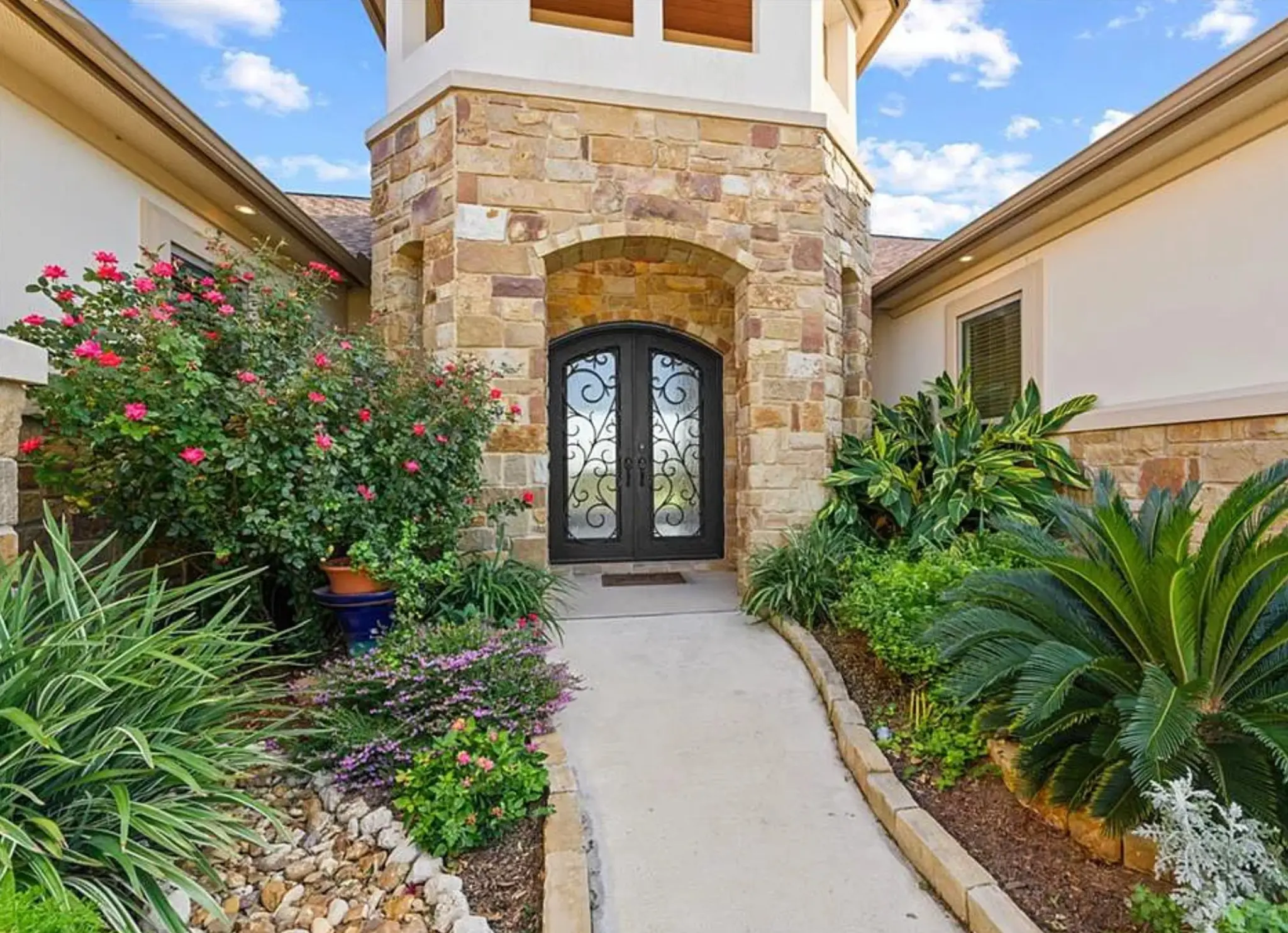 307 Highlander entry — stone and iron craftsmanship